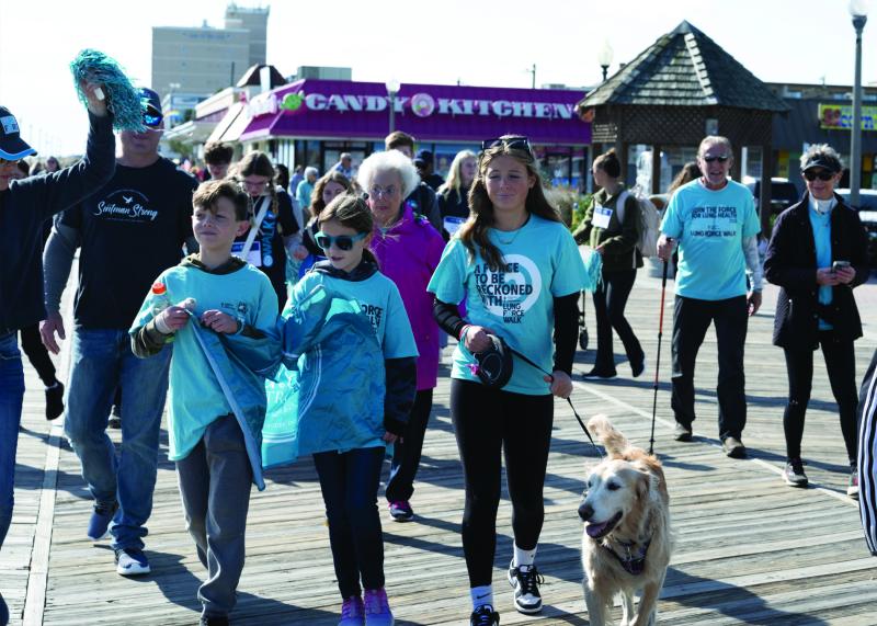 The crowd begins the walk, totaling two miles, along the Rehoboth Beach Boardwalk and back.